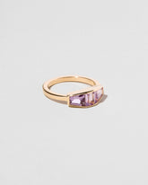 Dhatu Ring on light color background.