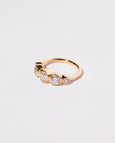 Lyra Ring on light color background.