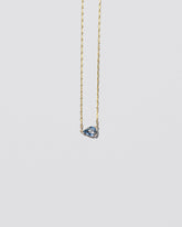 Say Yes Necklace on light color background.