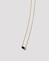 Up Necklace on light color background.