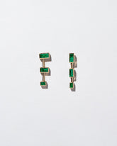 The Listening One Earrings on light color background.