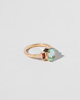 Thea Ring on light color background.