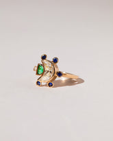Crescent Moon Ring on light color background.
