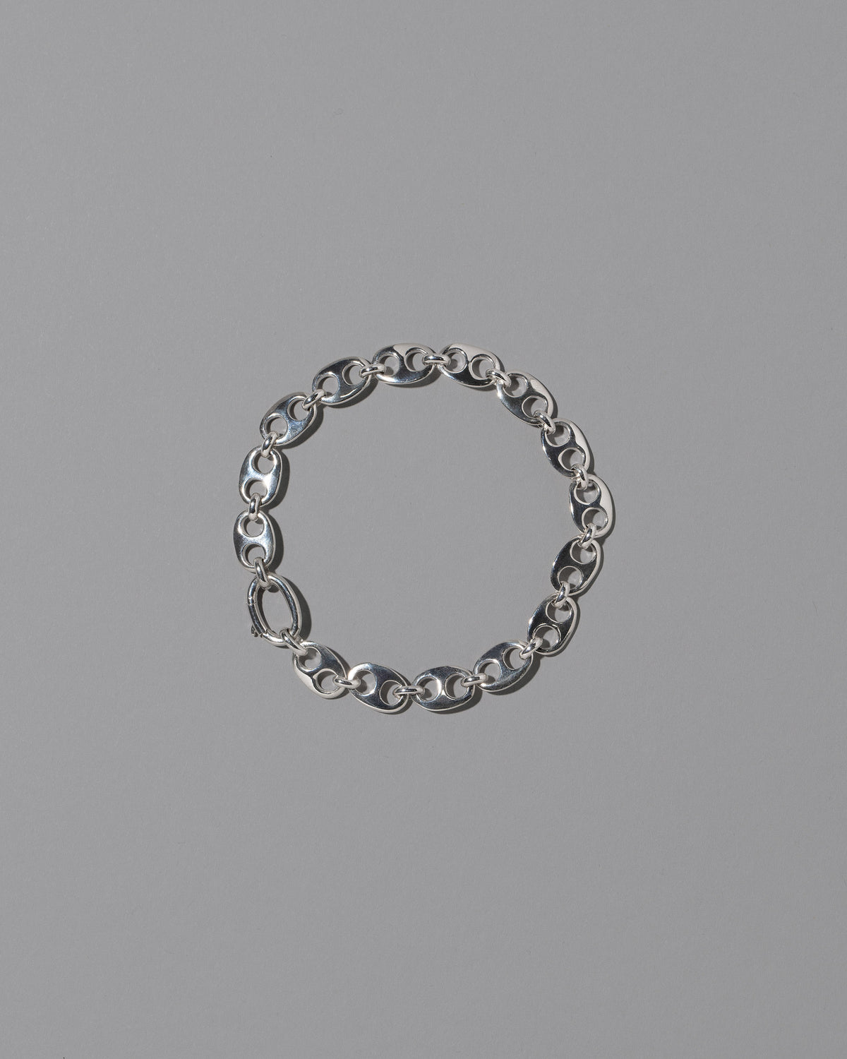 CRZM Sterling Silver Mini Yuba Bracelet on light color background.