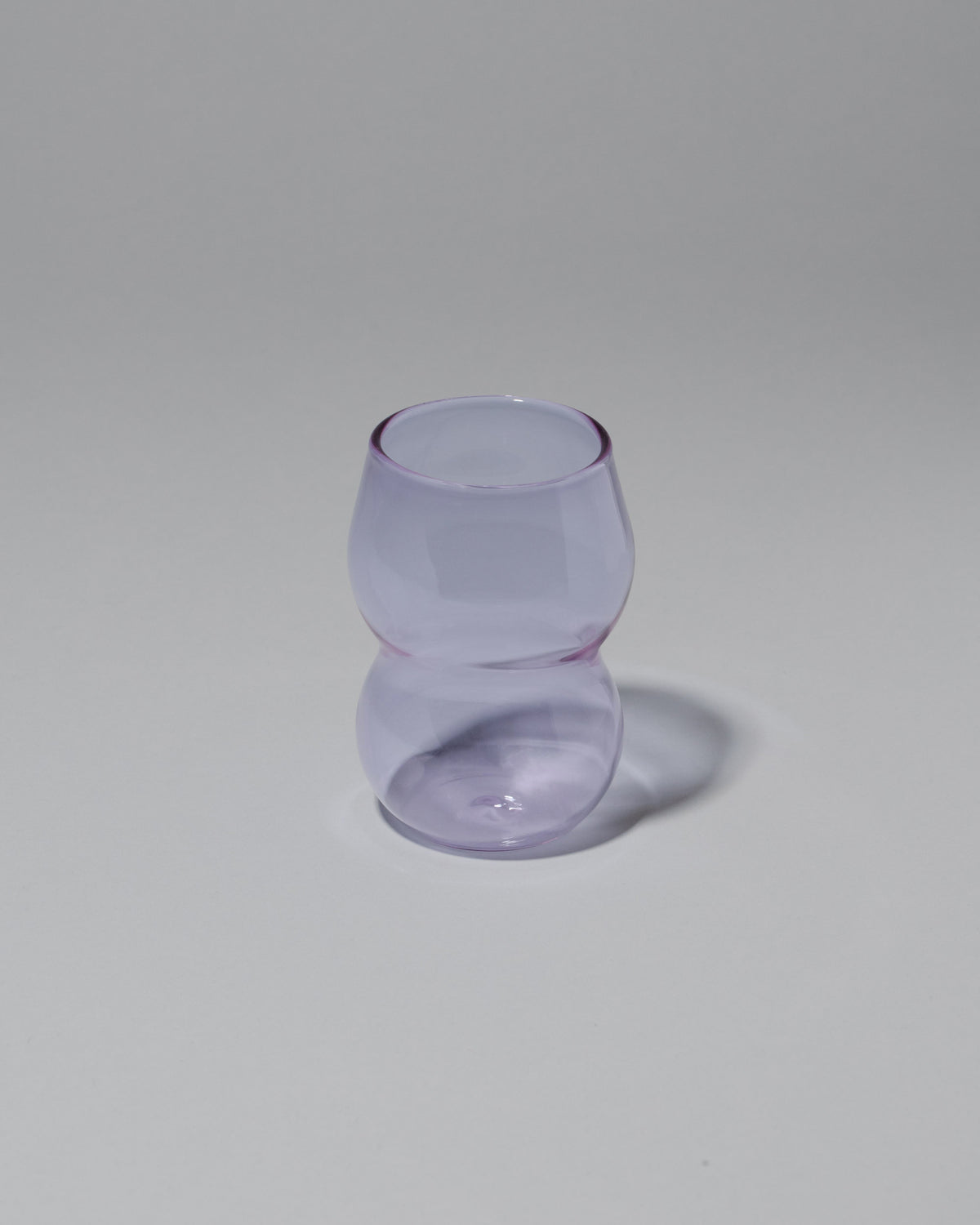 Ornamental by Lameice Lilac Transparent Dreamlike Cup on light color background.