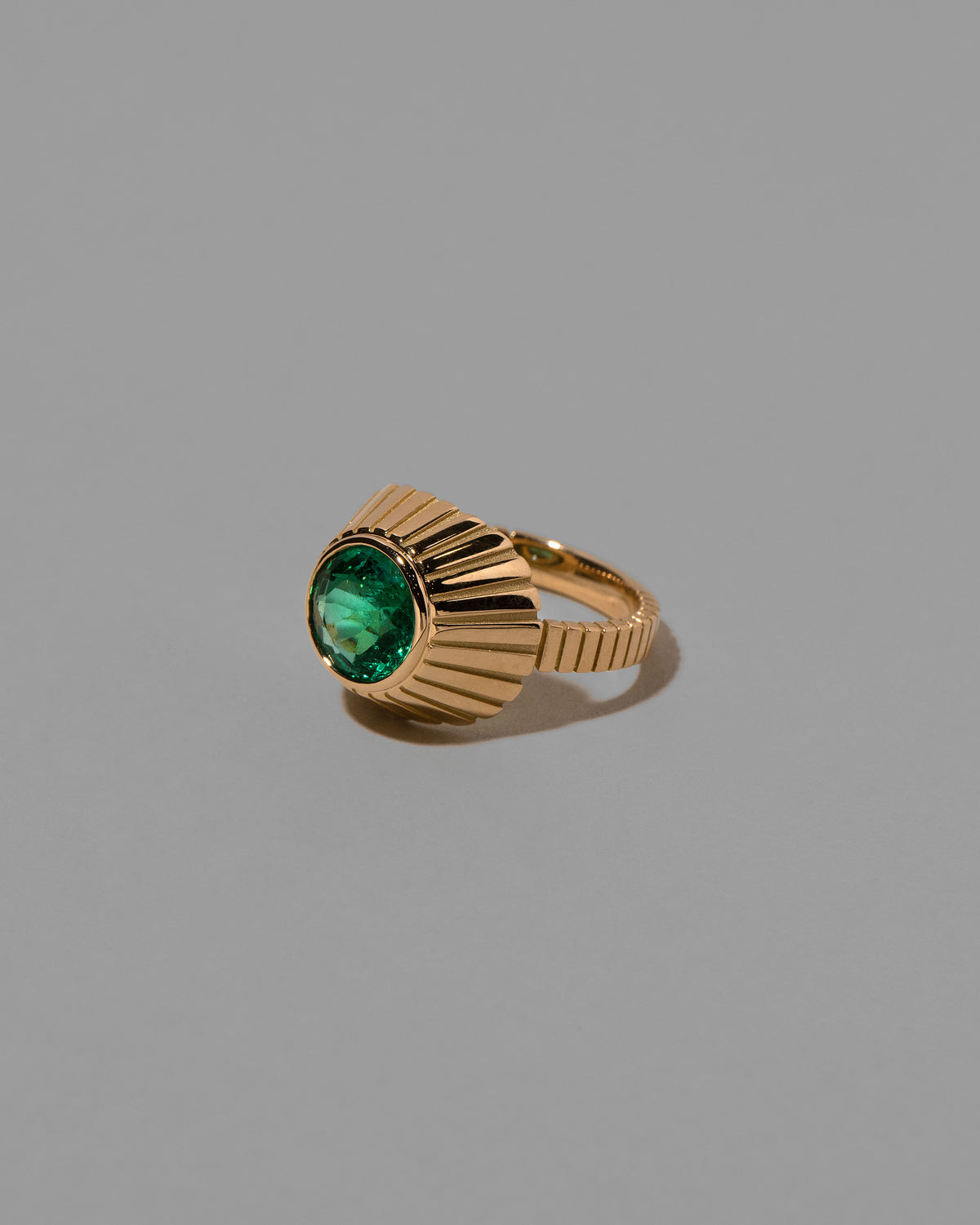 View from the side of the Eternal Life Ring on light color background.