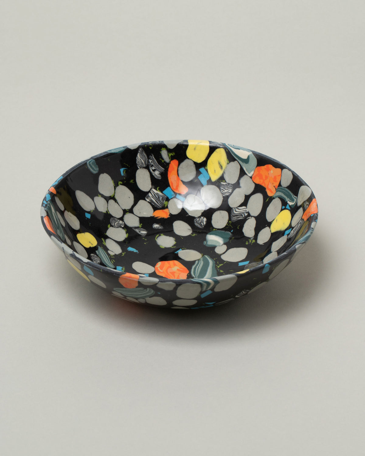 Slush Club Medium Nerikomi Bowl No. 235 on light color background.