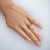 product_details::Gold Align Band and Yellow Diamond Balanced Ring on model.