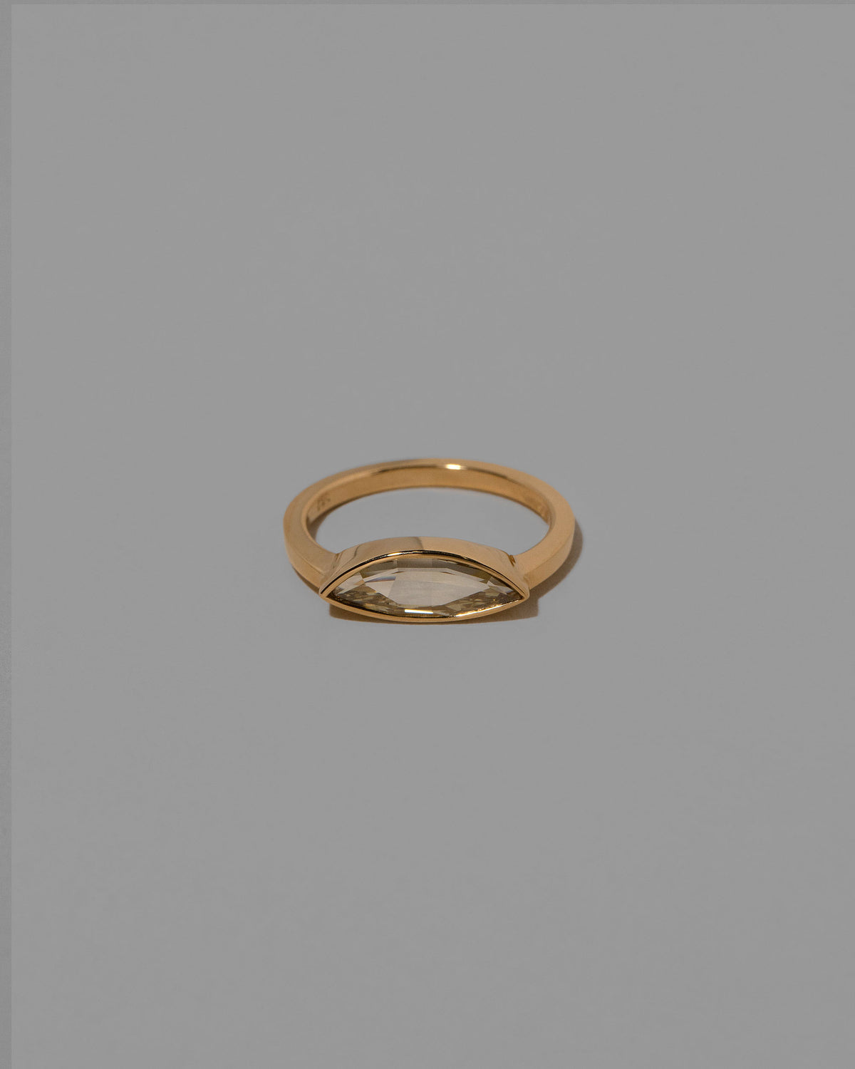Tenderness Ring on light color background.