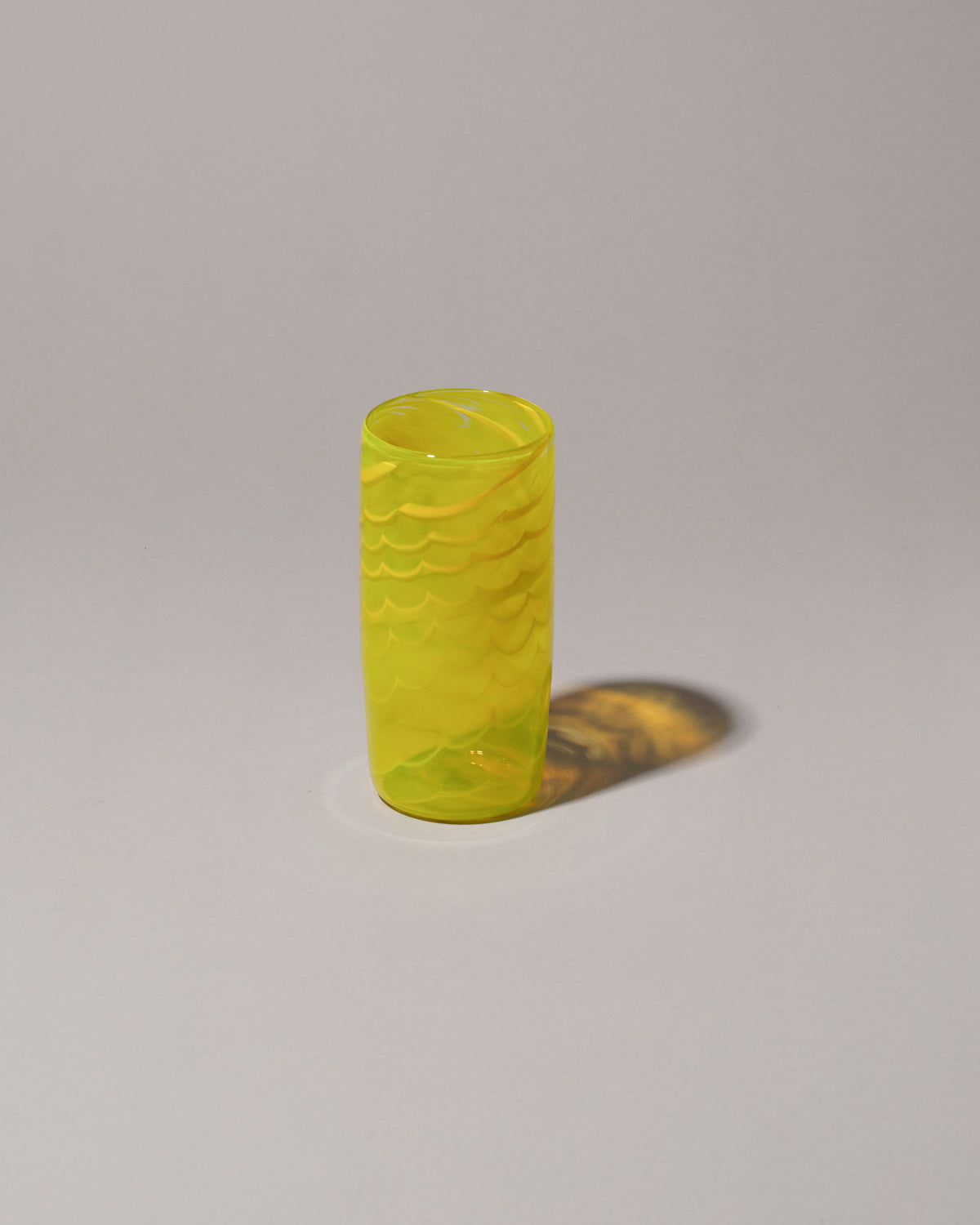 Sirius Glassworks Pure Sunshine Tumbler on on light color background.