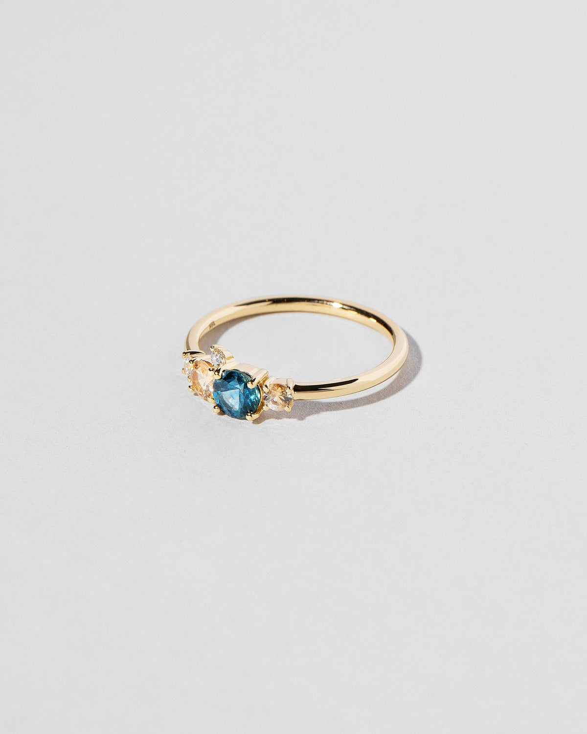 View from the side of the Aster Ring on light color background.