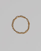Wavy Link Chain Bracelet on light color background.
