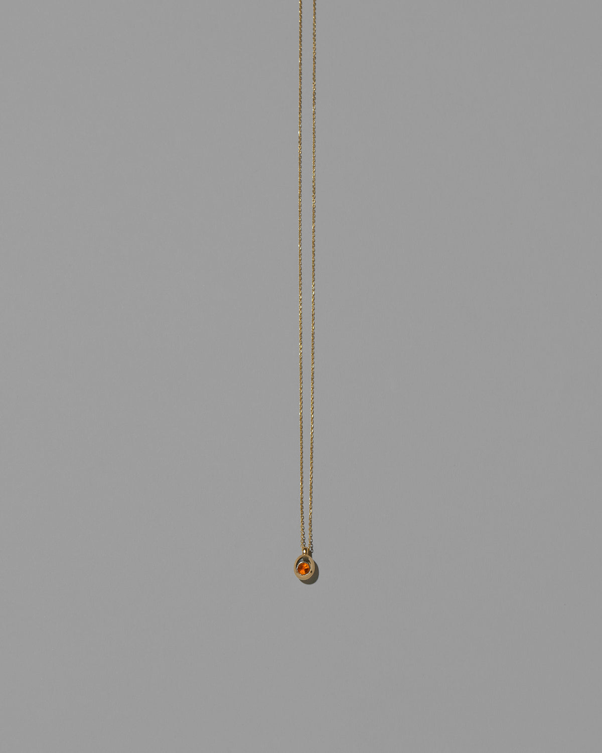 Citrine Birthstone Level Necklace on light color background.