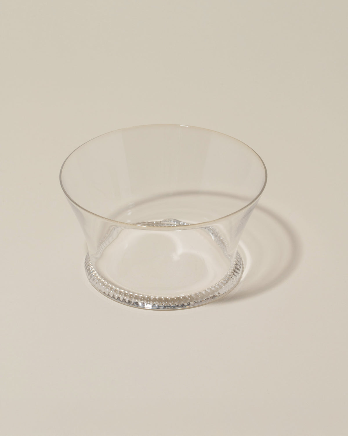 Closeup details of the Bollenglass Design Petite Bowl on light color background.