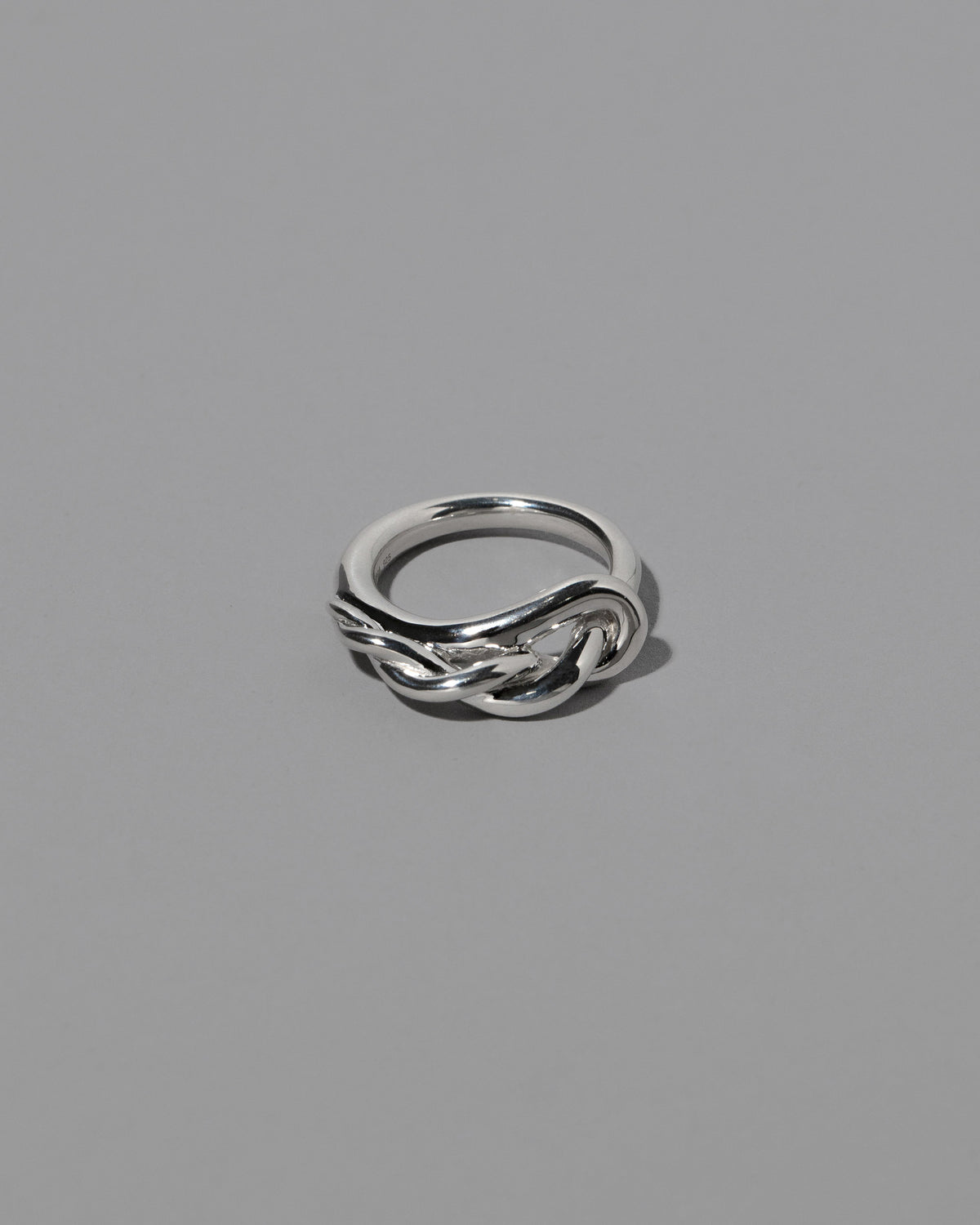 CRZM Sterling Silver Ophiolite Ring on light color background.