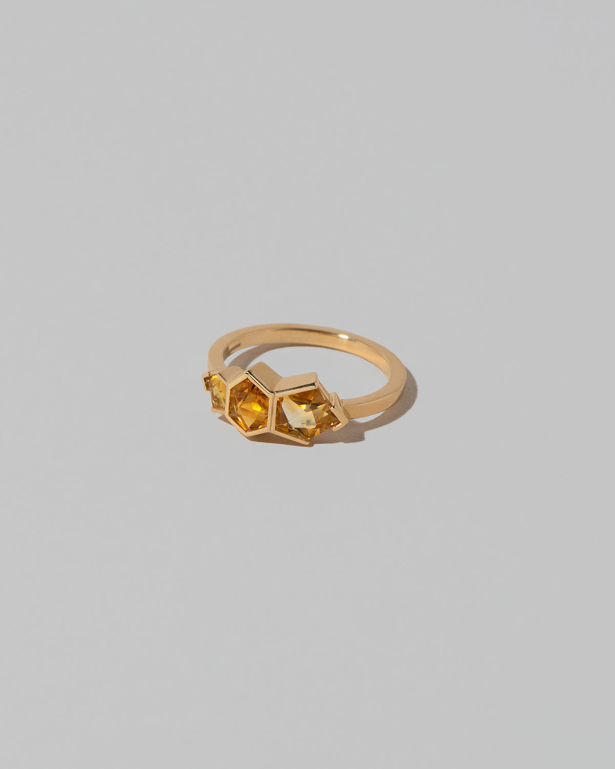 View from the side of the Cattleya Ring on light color background.