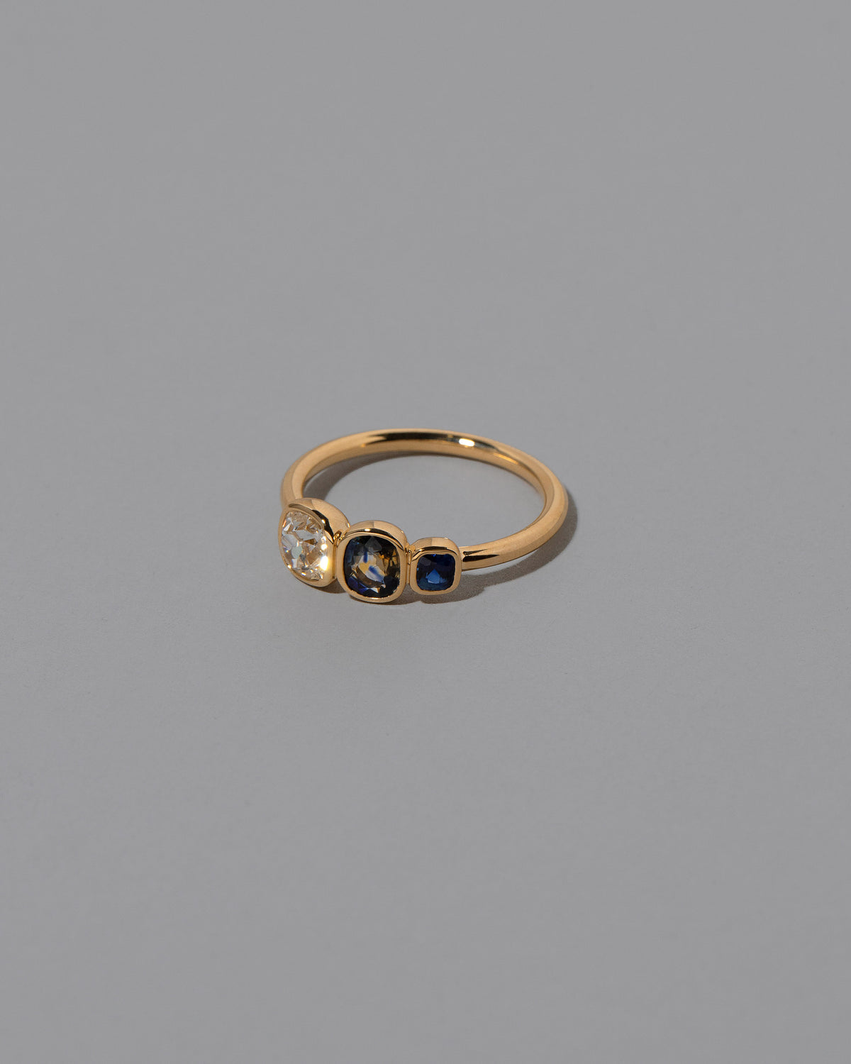 View from the side of the Cornucopia Ring on light color background.