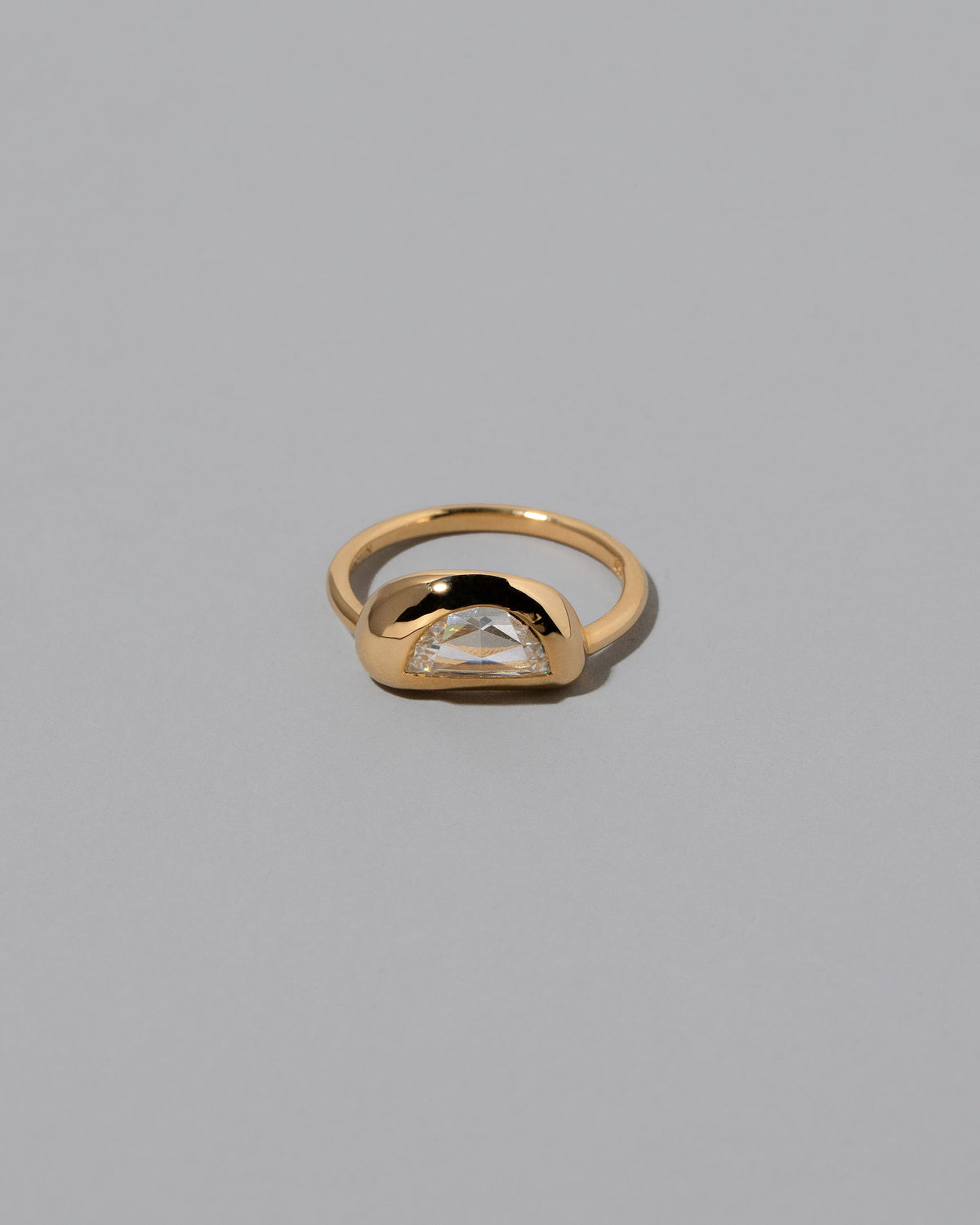 Lined Up Ring on light color background.