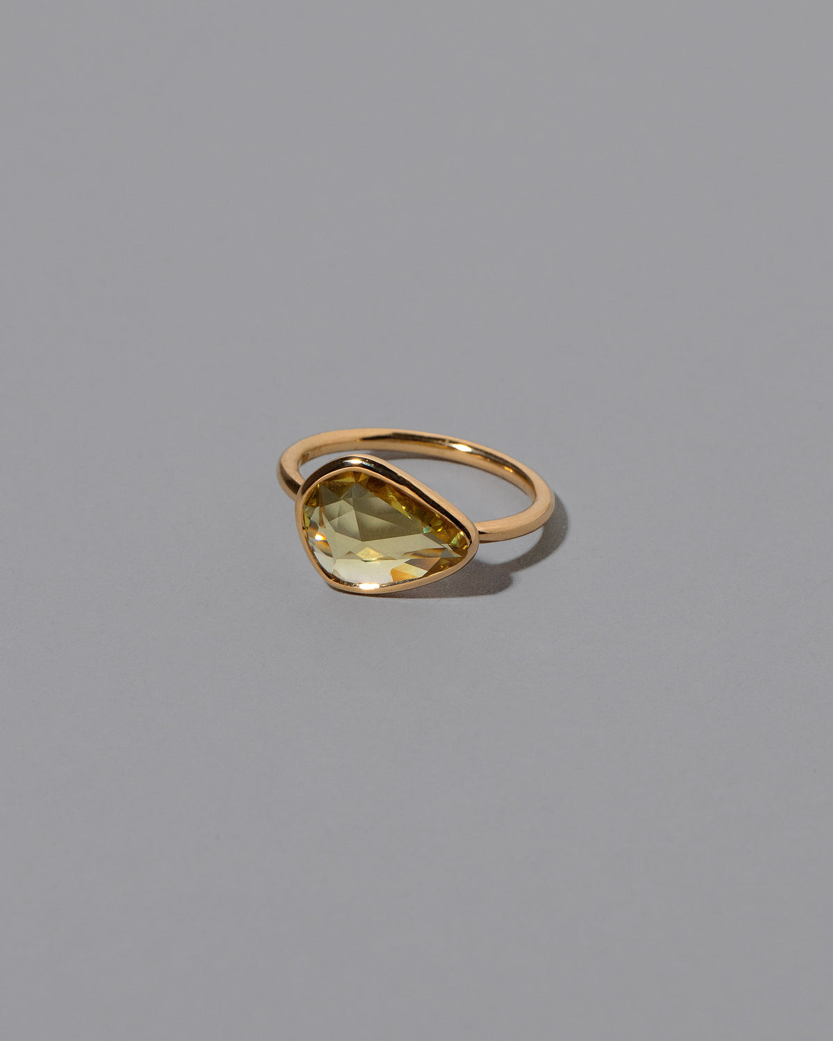 View from the side of the Emergence Ring on light color background.