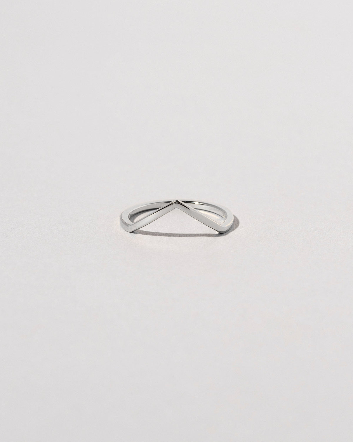 Platinum Solid Square Wire High Peak Band on light color background.