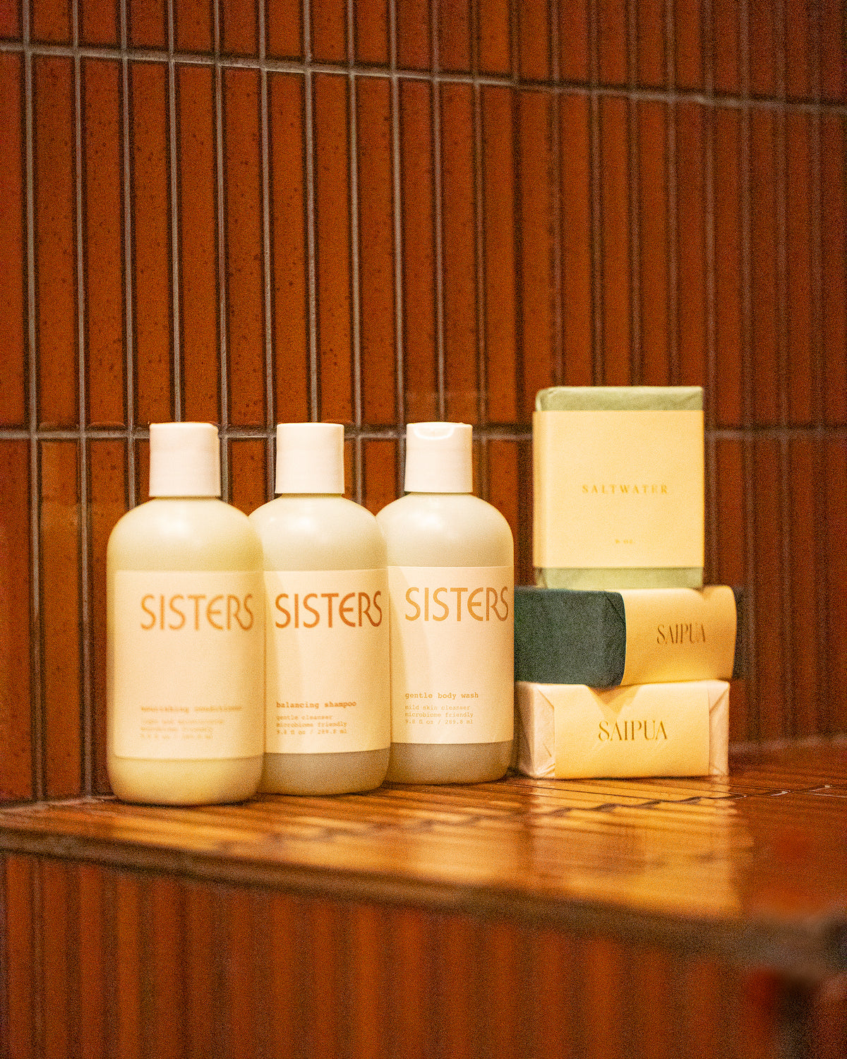 Sisters Body Gentle Body Wash, Balancing Shampoo and Nourishing Conditioner and Saipua Saltwater, Vetiver with French Green Clay, Black Soap with Charcoal and Patchouli bar soaps.