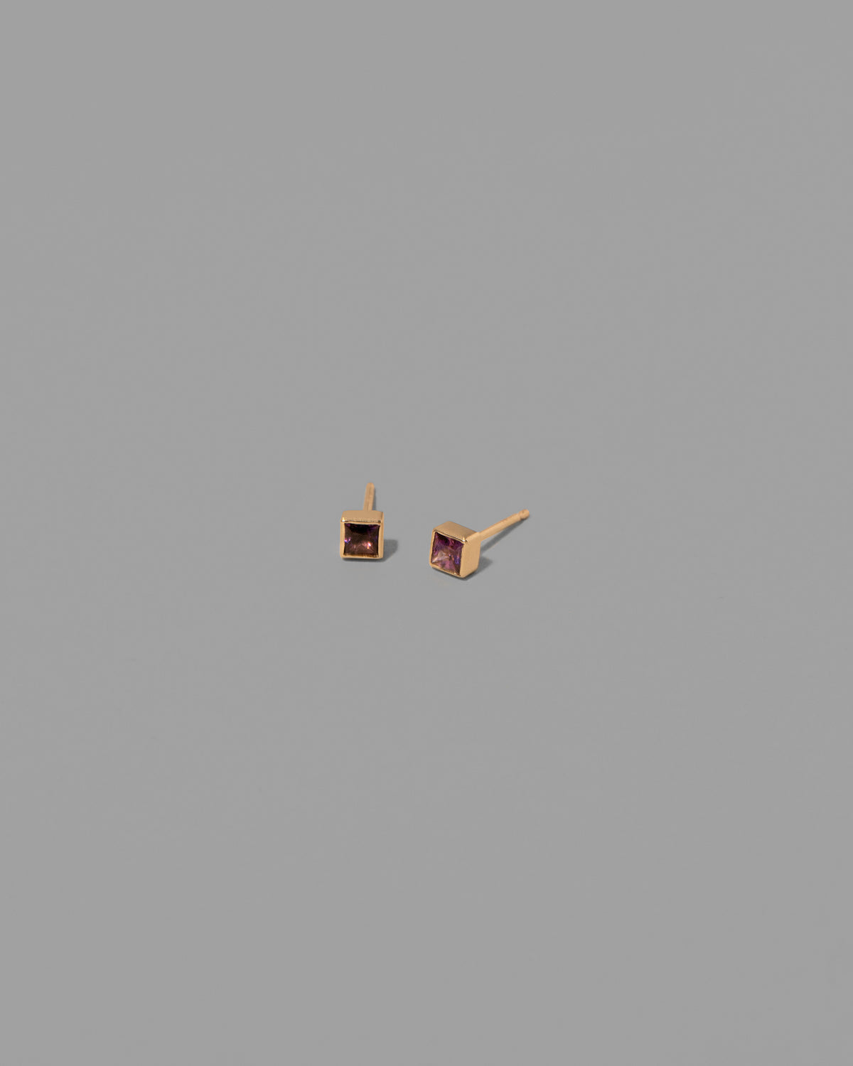 Petite Bicolor Pink/Blue Sapphire Square Frame Earrings on light color background.