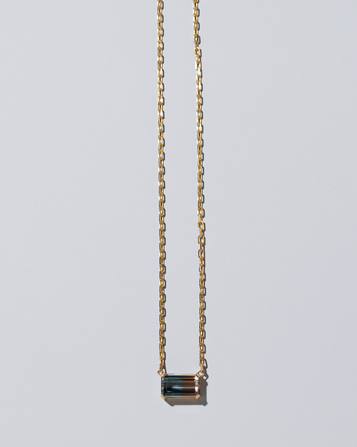 Highest Path Necklace on light color background.