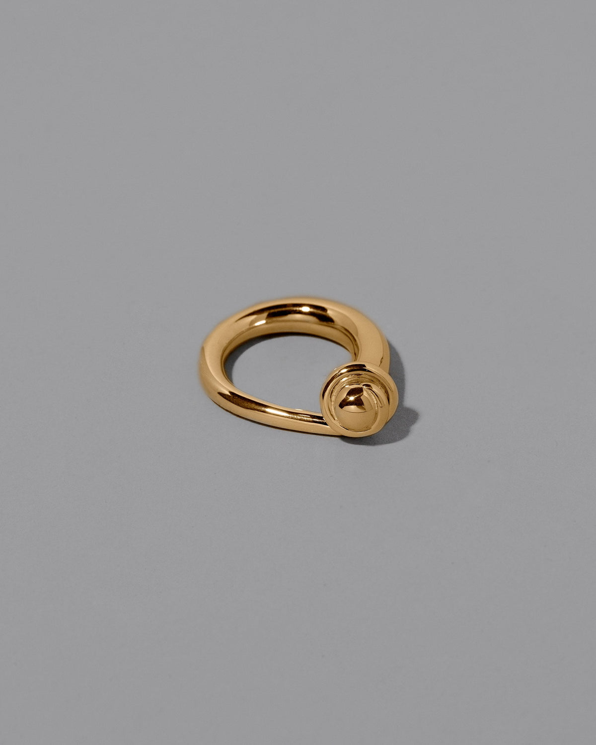 CRZM Boulder Ring on light color background.