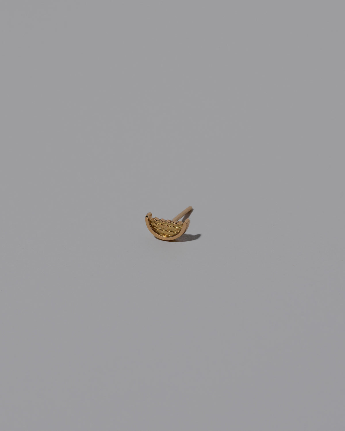 Water Stud Earring Single on light color background.