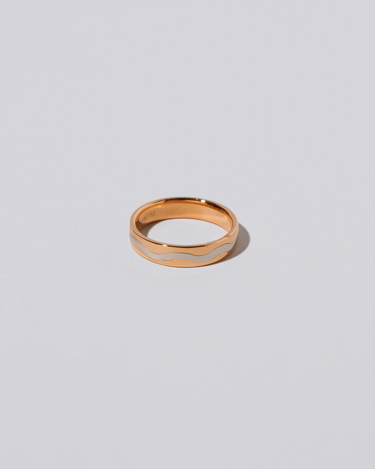 5mm Rose 18K Outside and Platinum Inside Swimming Pool Band on light color background.