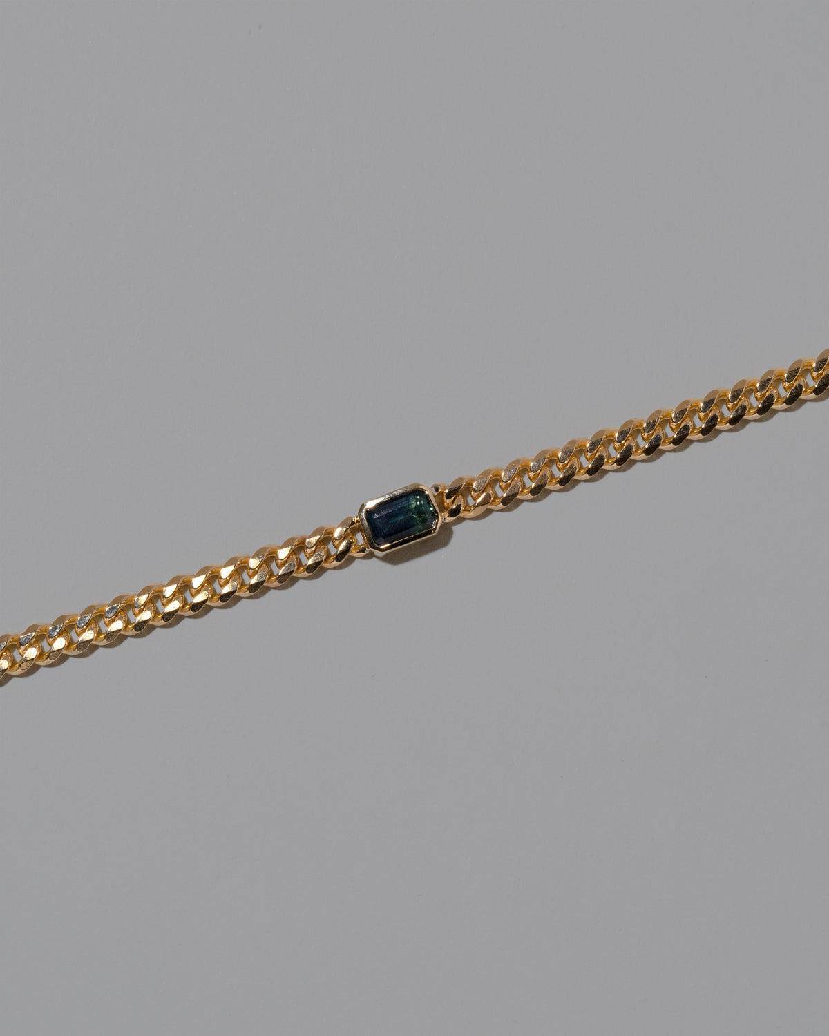 Closeup details of the Attachment Bracelet on light color background.