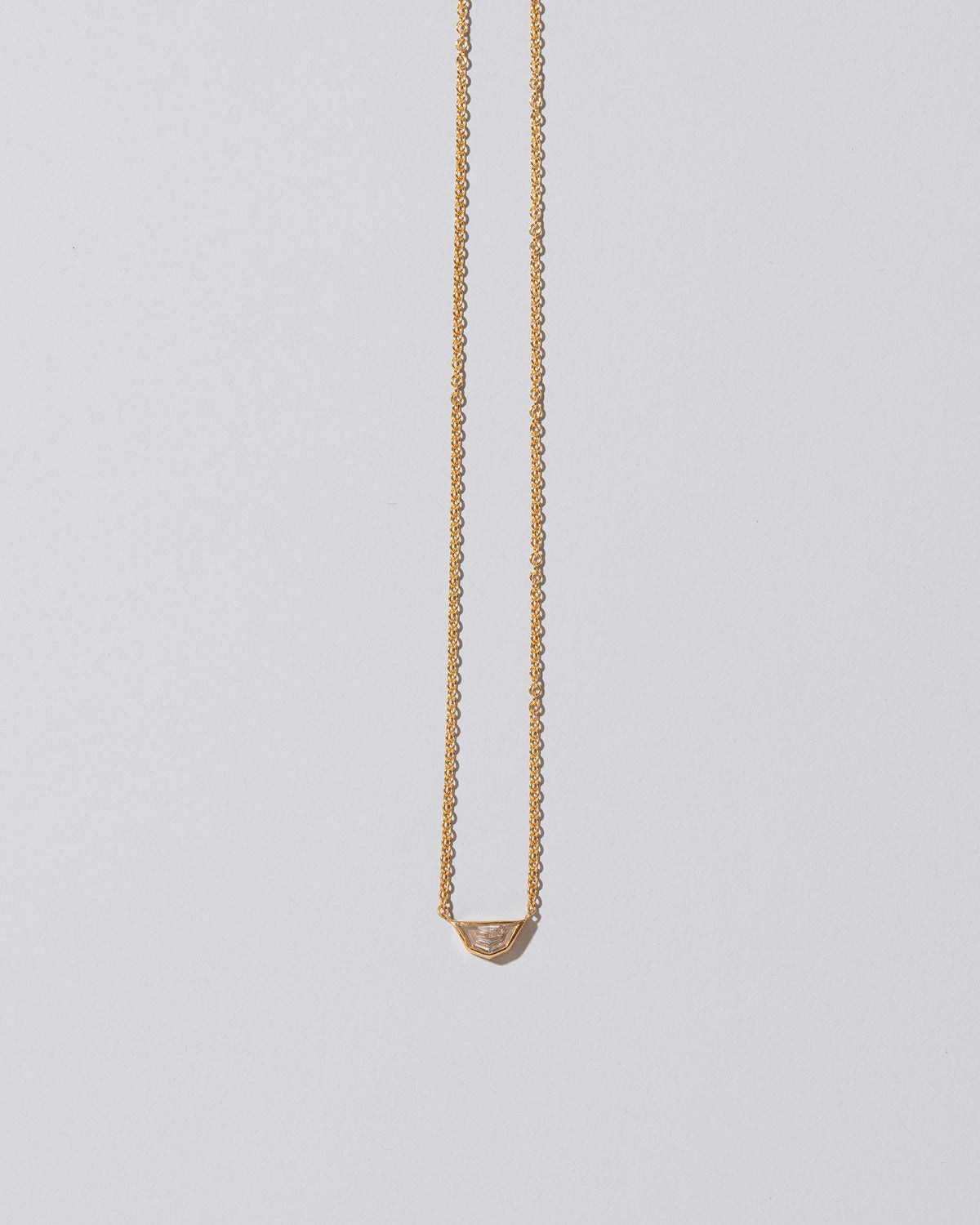 Adamas Necklace on light color background.