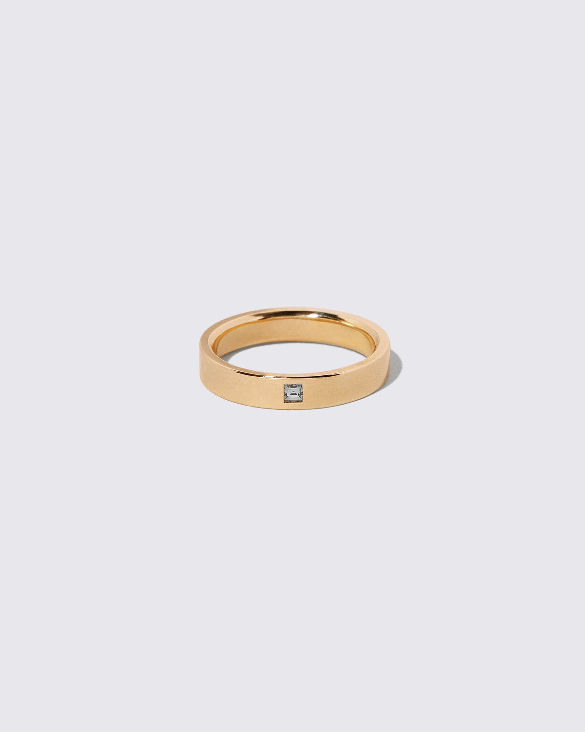 Gold Diamond 4mm Square Cut Piet Band on light color background.