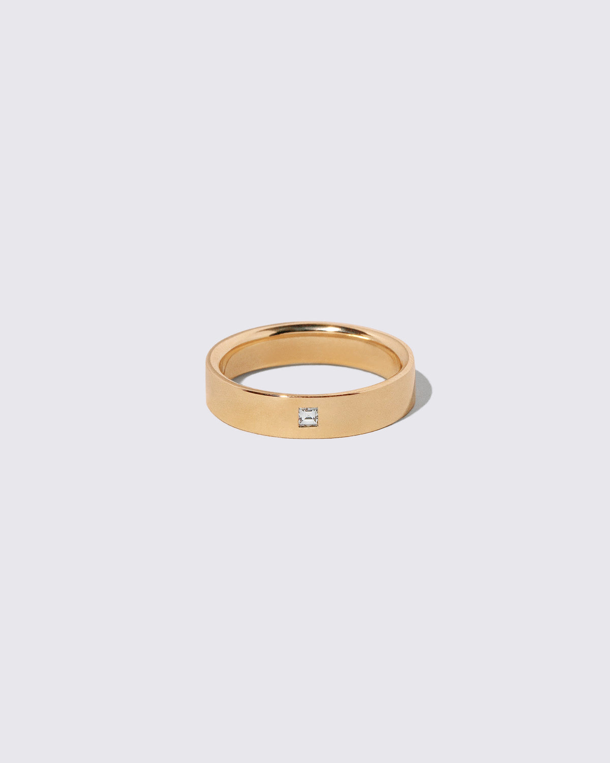 Gold Diamond 5mm Square Cut Piet Band on light color background.