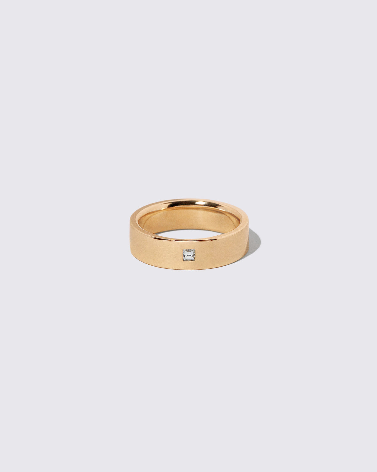 Gold Diamond 6mm Square Cut Piet Band on light color background.