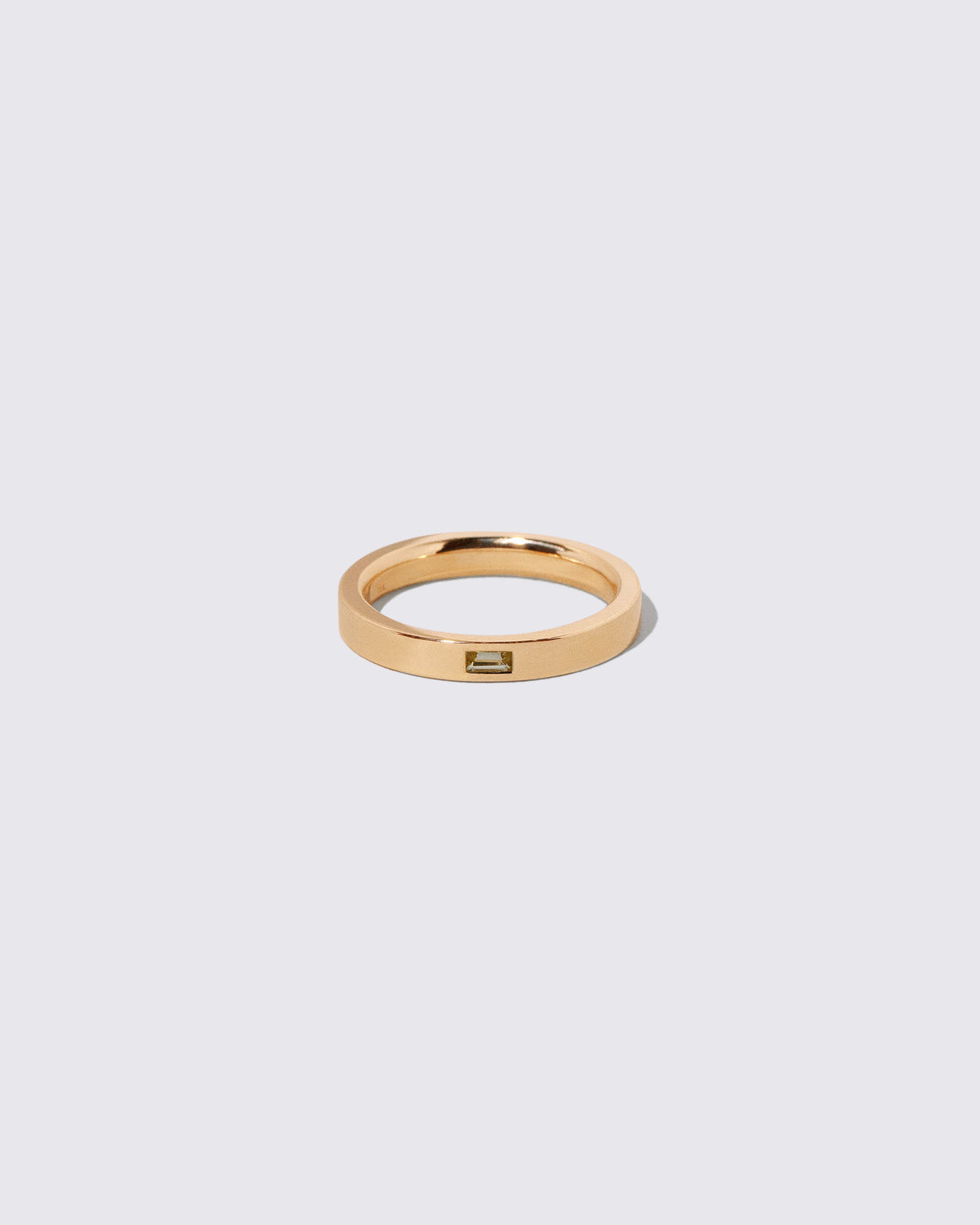 Gold Yellow Beryl 3mm Baguette-Set Piet Band on light color background.