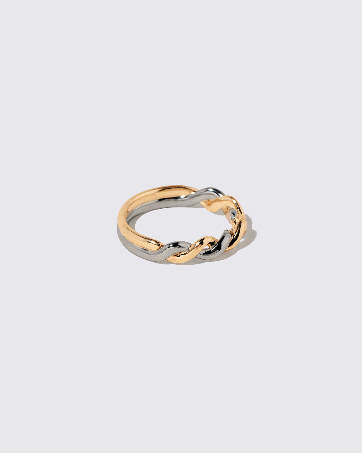 View from the side of the Two Tone Twist Band on light color background.