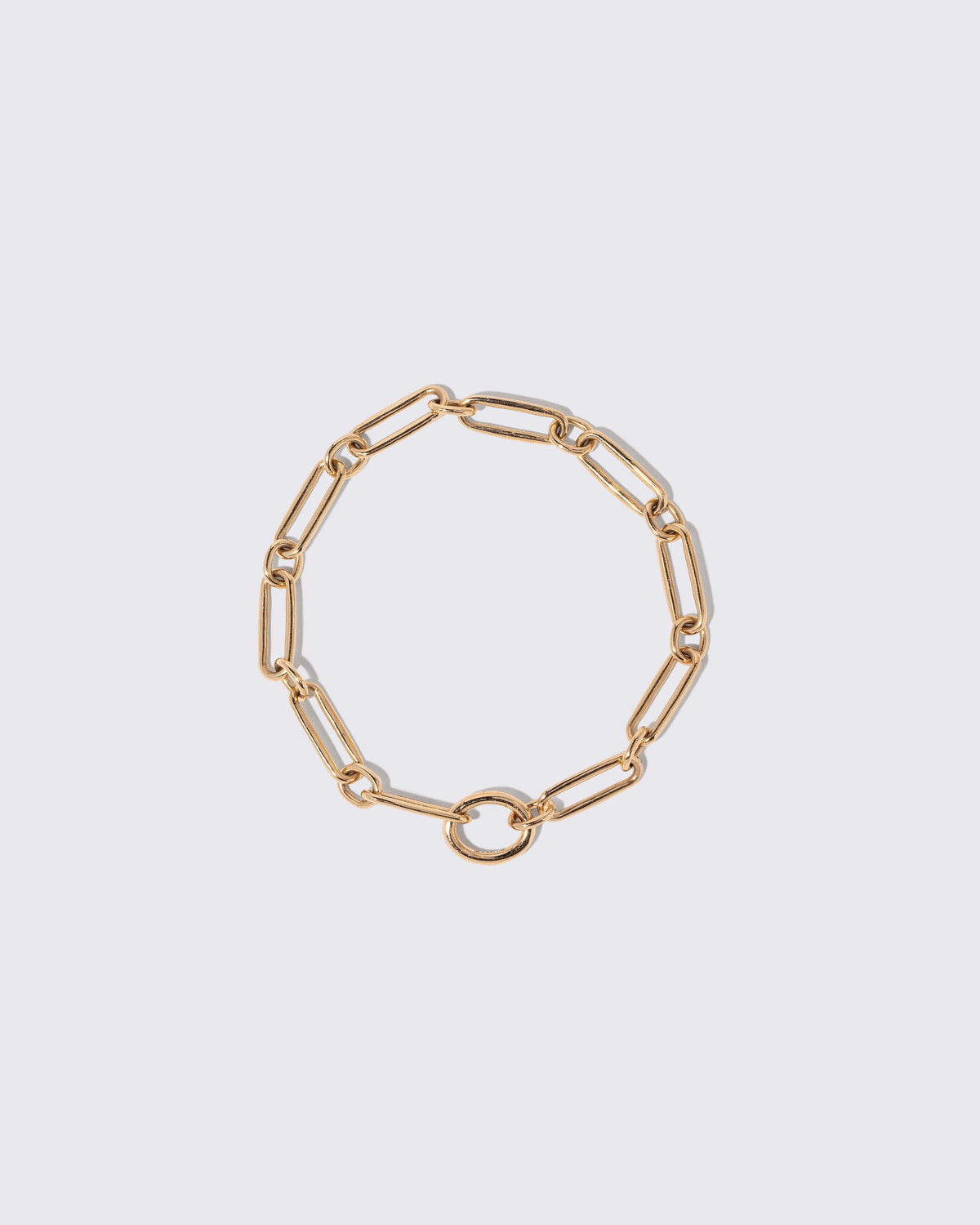 Petite Link Bracelet on light color background.