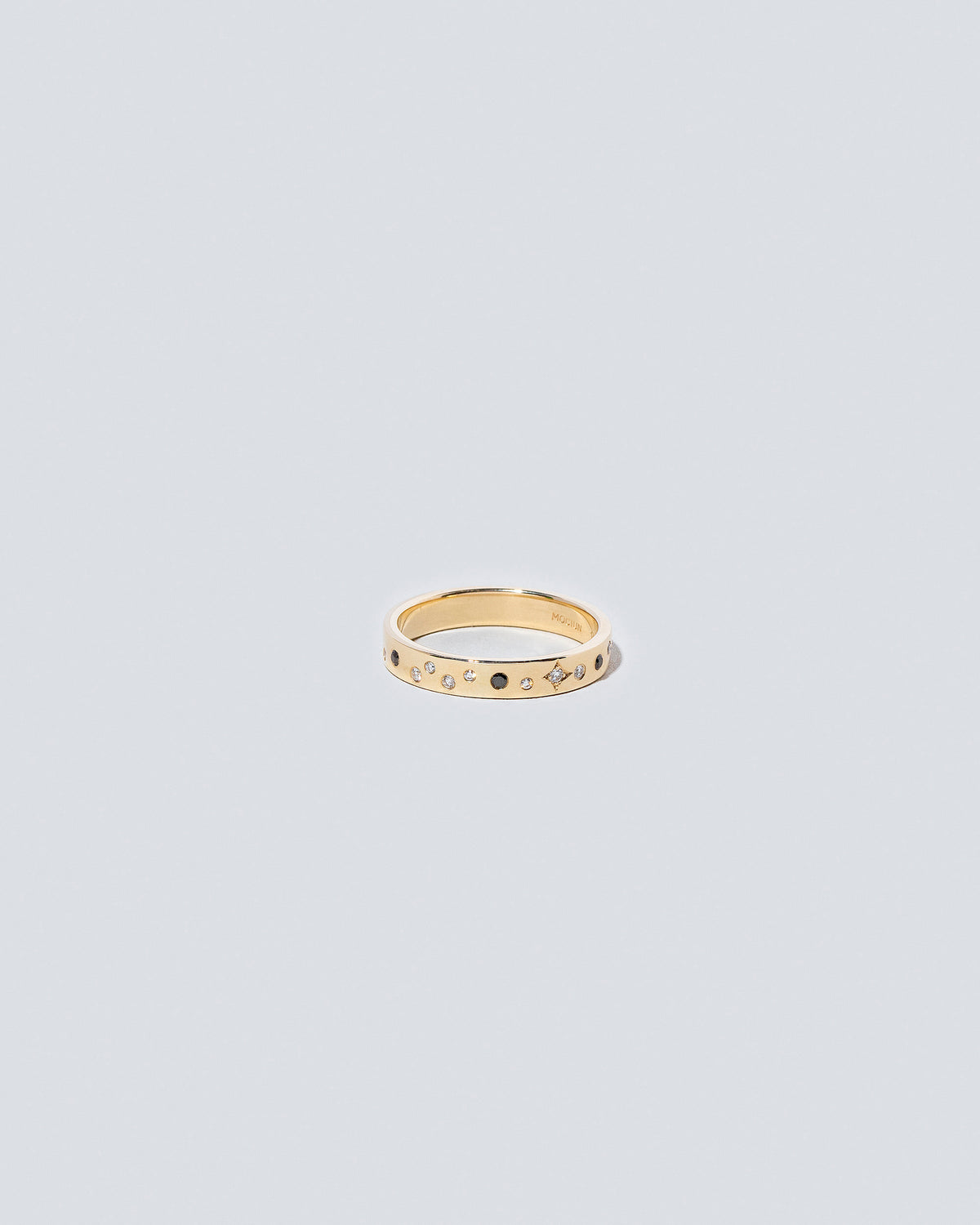 Gold with Little Array Black & White Diamonds 2.5mm Square Wire Band on light color background.