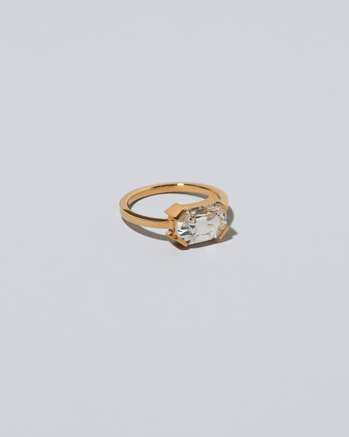 View from the side of the Bright Future Ring on light color background.