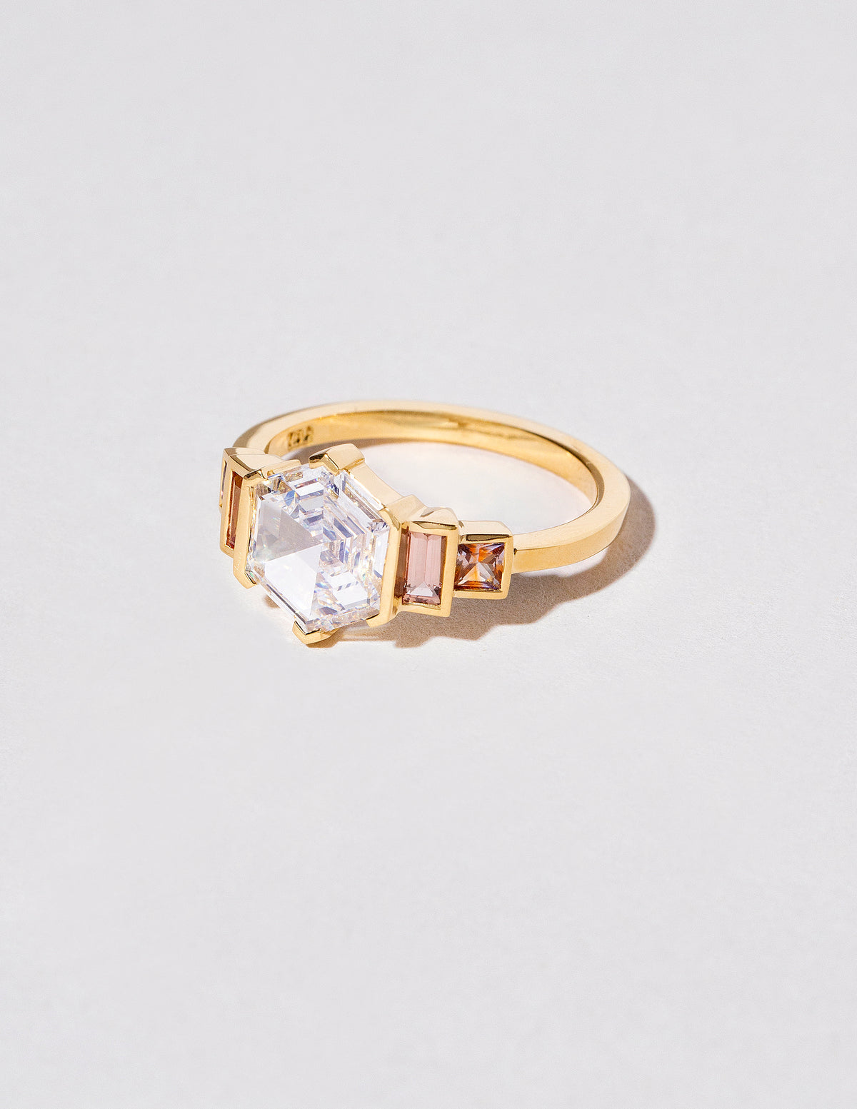 View from the side of the Carina Ring on light color background.