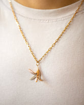 2.2mm Beveled Oval Chain Necklace and Banana Peel Charm on model.