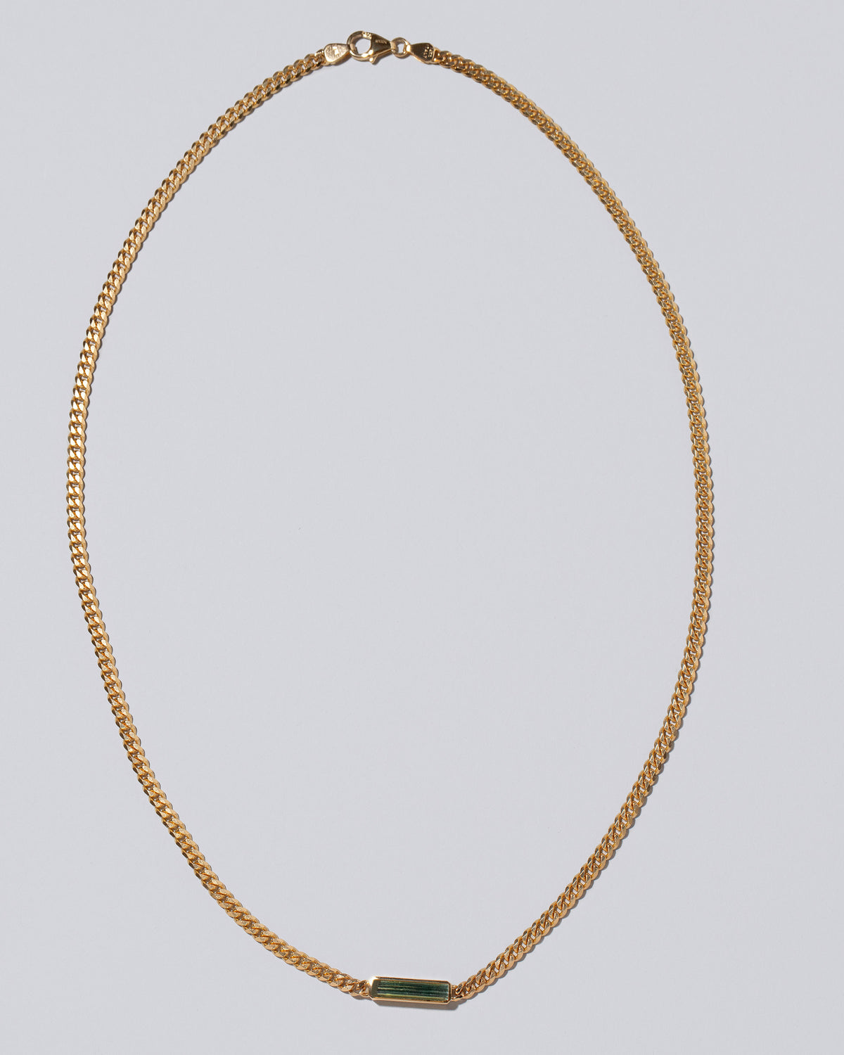 Lucid Thinking Necklace on light color background.