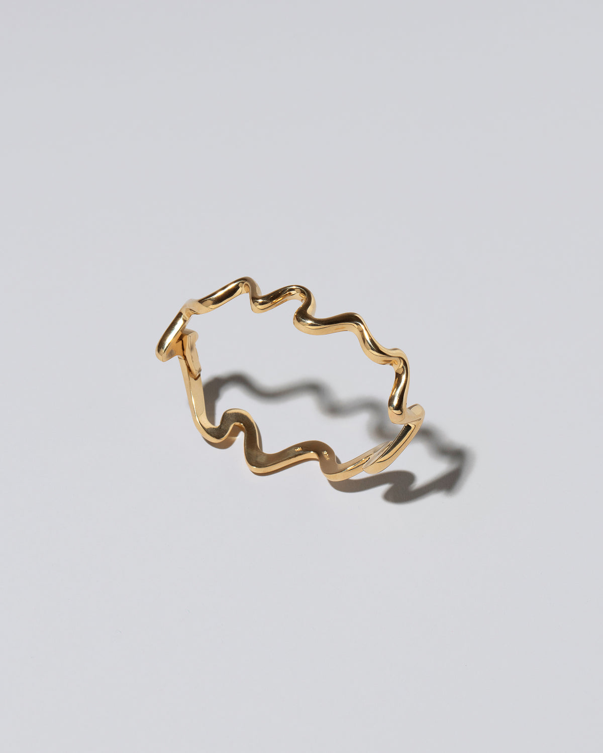 Cut-Outs Bracelet on light color background.