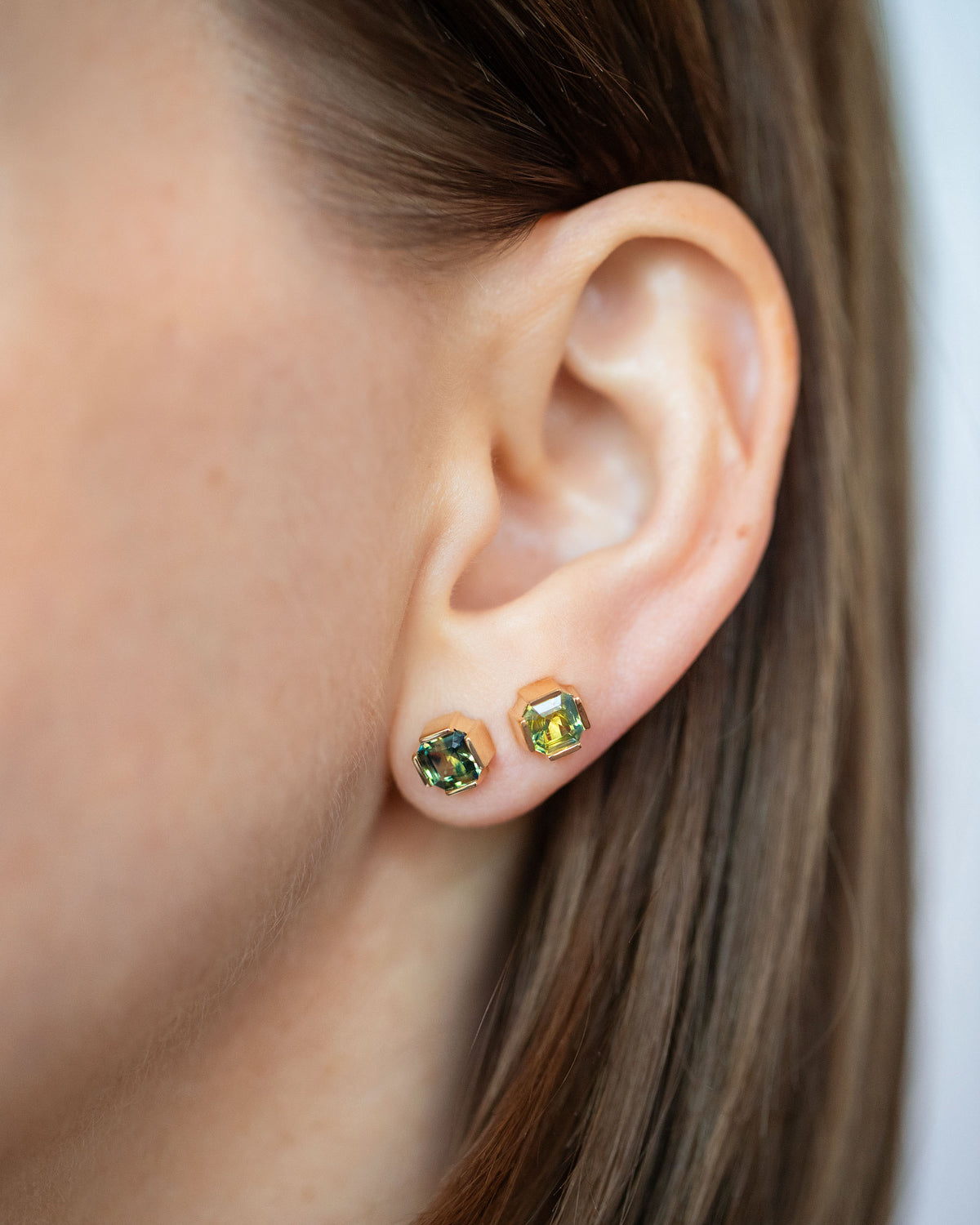 Bicolor Sapphire Fold Earrings on model.