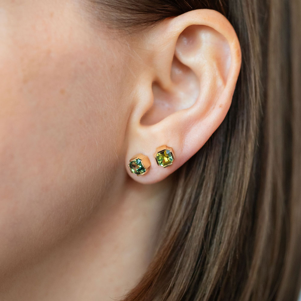 product_details::Bicolor Sapphire Fold Earrings on model.