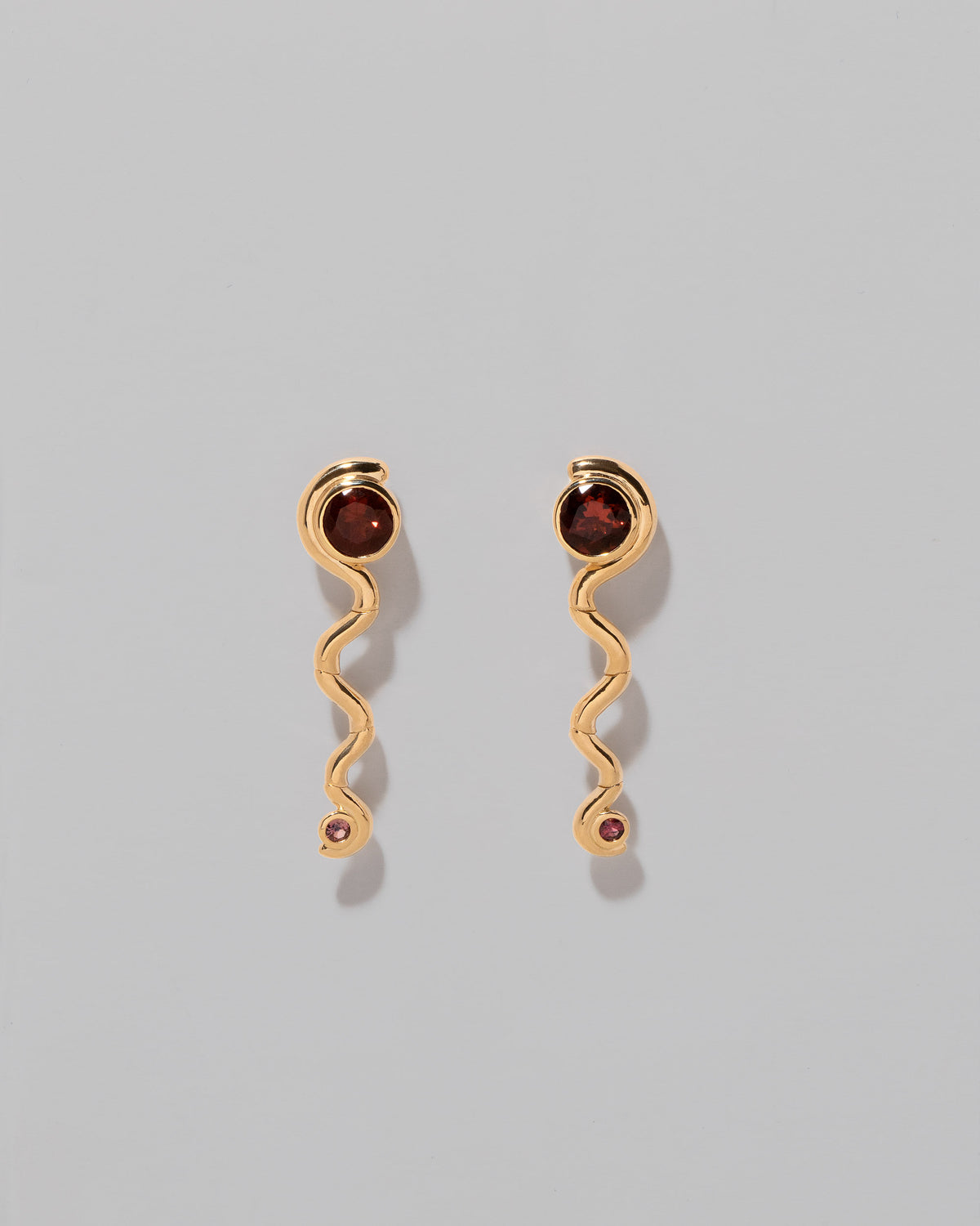 Disa Earrings on light color background