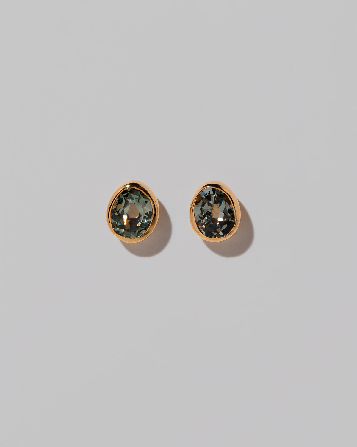 Juniper Studs on light color background.