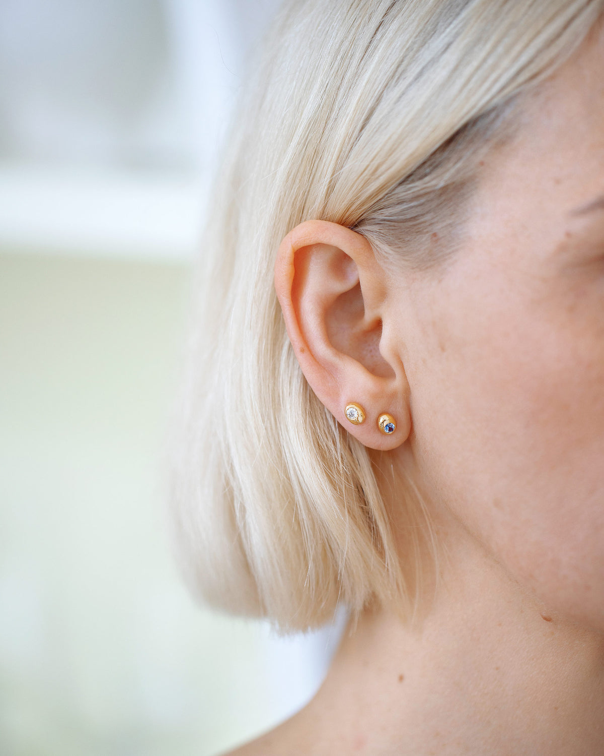 Diamond Birthstone Level Stud Earring and Bicolor Sapphire Level Stud Earrings.
