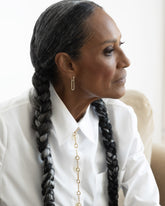 Styled image on model featuring Styling Huggie Hoop Earring Single with Styling Link and Link Necklace.